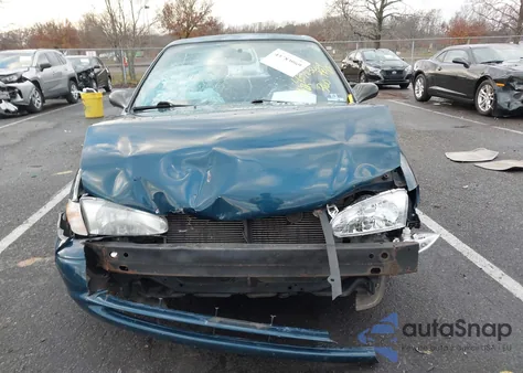 2001 Chevrolet Prizm z USA, uszkodzony, nr VIN 1Y1SK52821Z443097